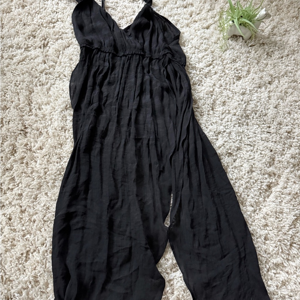 Cute wrap around bathing suit swim suit black flowy see through cover up.